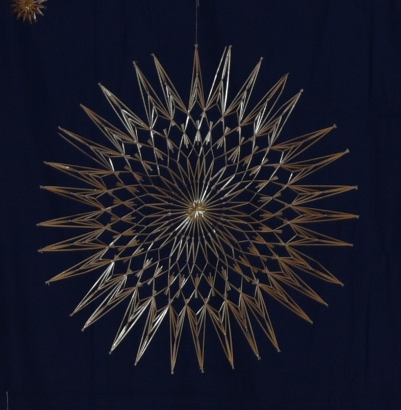 Dekoration Advents-Singen: großer Strohstern